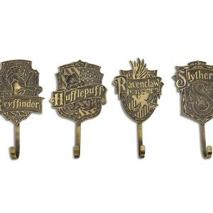 Harry Potter Gold Hogwarts Houses Wall Hooks 4-Piece Set